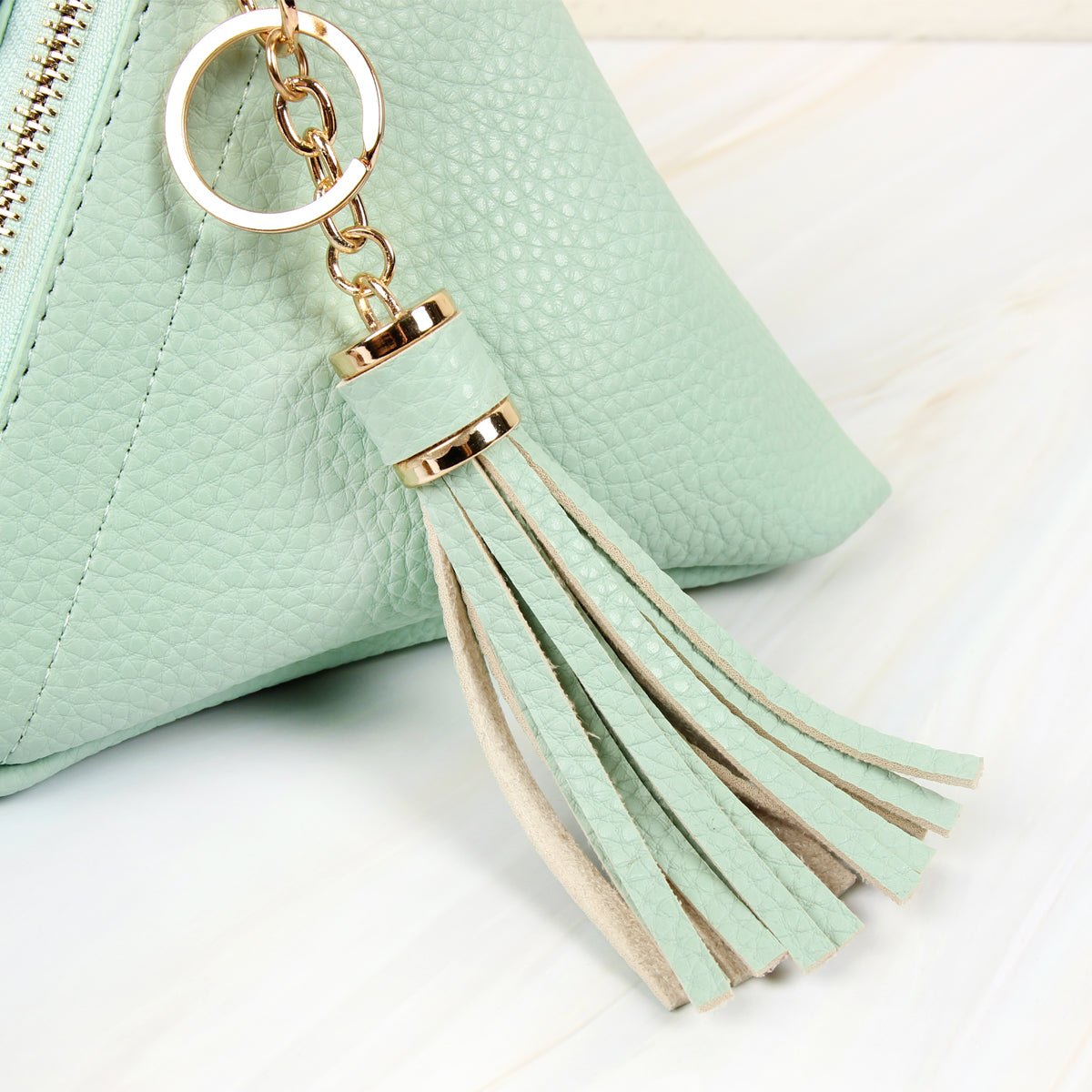 Pyramid Tassel Wristlet Bag