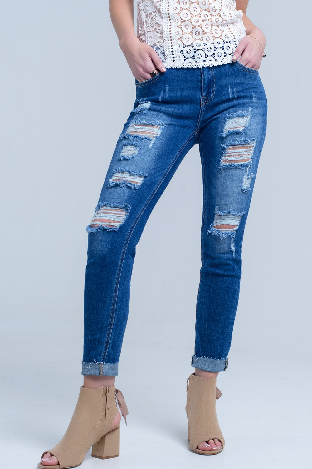 Distressed Skinny Jeans with Shredded Rips and Raw-Cut Cuffs